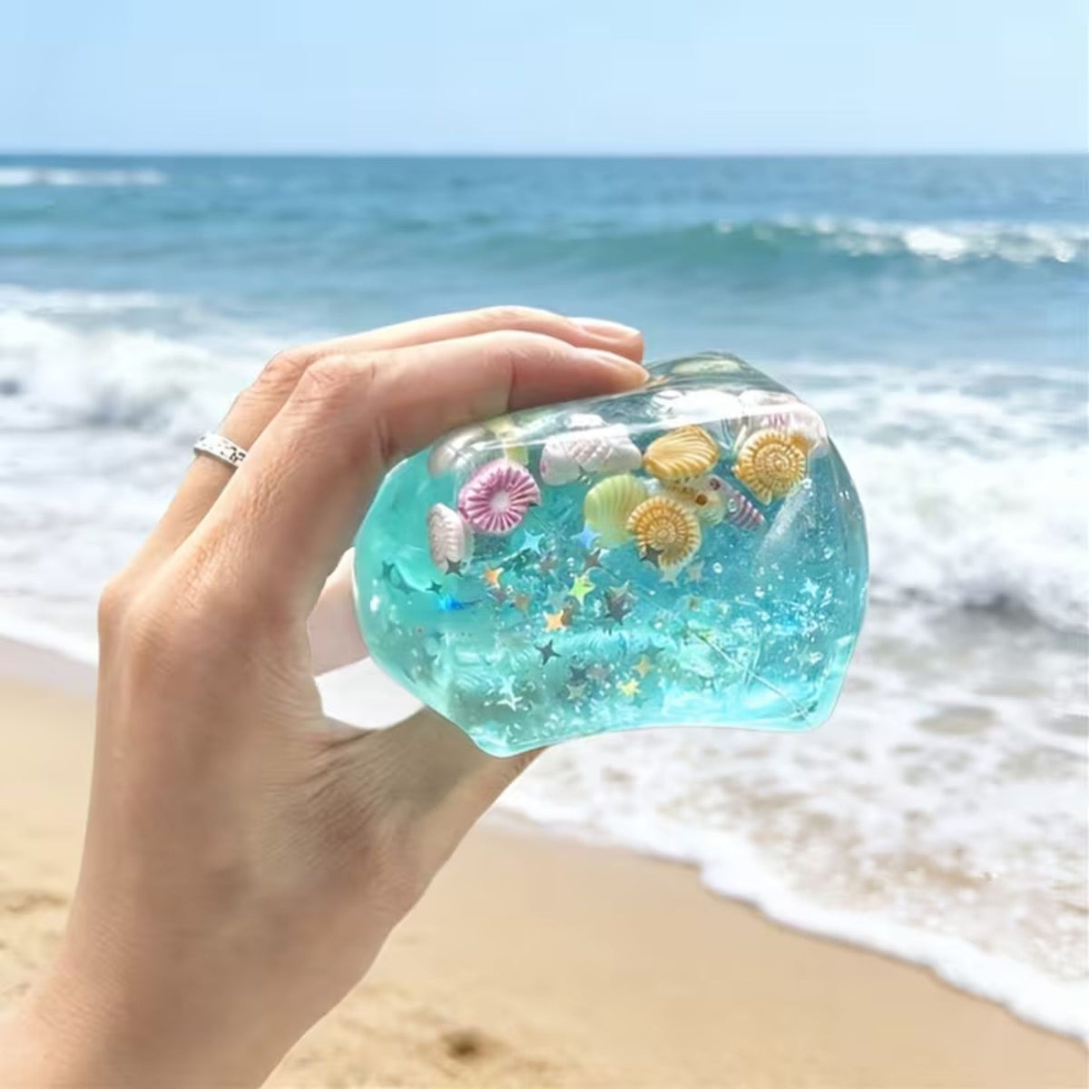 Jucarie Squishy Antistres, Cub Fidget 3D Ice Cube cu Stele Maritime, Revenire Lenta, TPR Elastic, 3x3 cm, Albastru