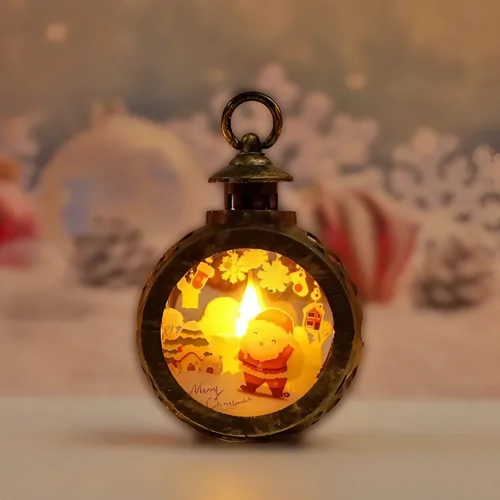 Felinar Decorativ de Craciun cu LED, Lumanare Interioara si Inscriptie Mos Craciun, Lumina Alb Cald, Plastic si Geam, 13.5 x 9 cm, Bronz Auriu, Baterii Incluse