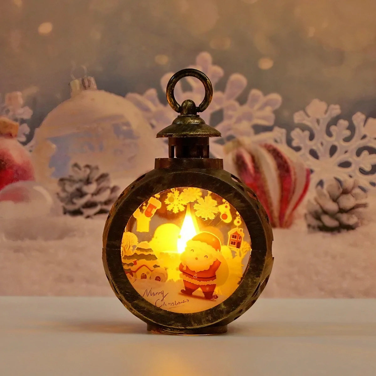 Felinar Decorativ de Craciun cu LED, Lumanare Interioara si Inscriptie Mos Craciun, Lumina Alb Cald, Plastic si Geam, 13.5 x 9 cm, Bronz Auriu, Baterii Incluse