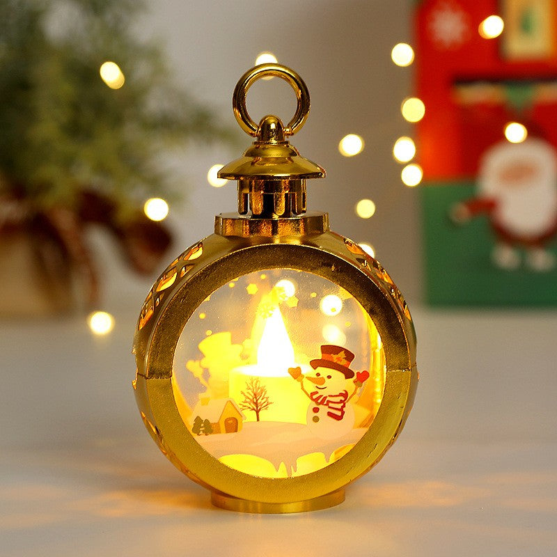 Felinar Decorativ de Craciun cu LED, Lumanare Interioara si Inscriptie Om de Zapada, Lumina Alba Calda, Plastic si Sticla, Baterii Incluse, 13.5 x 9 cm, Auriu