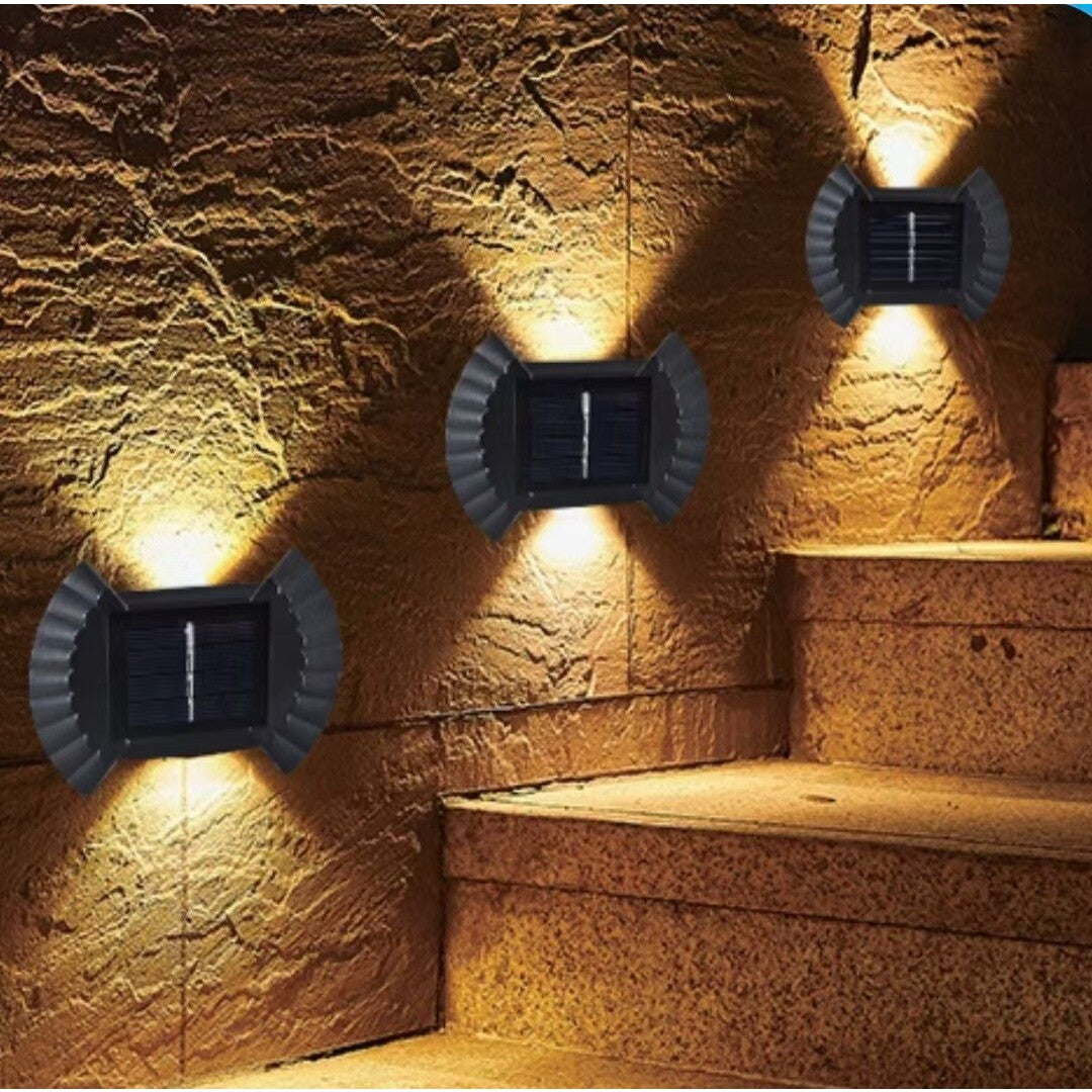 Set 4 Aplice Solare LED Bidirectionale pentru Perete, Lampi de Exterior Impermeabile IP65 cu 8 LED-uri, Autonomie 8-12 Ore, Design Funda, Material ABS, 10 x 7.5 cm, Lumina Alba Calda