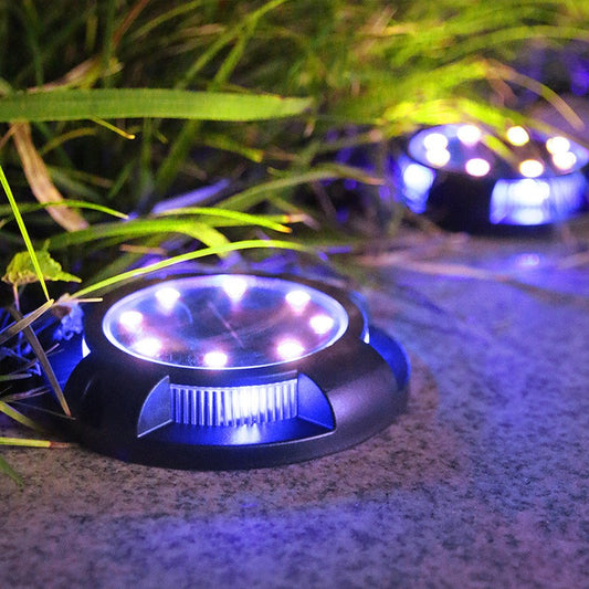 Lampa Solara LED Tip Spot Pentru Gradina, 12 LED-uri cu Lumina Alb Rece si RGB Multicolora, Protectie IP65, Senzor Crepuscular, Material ABS, Acumulator 700 mAh, 11x13.5 cm