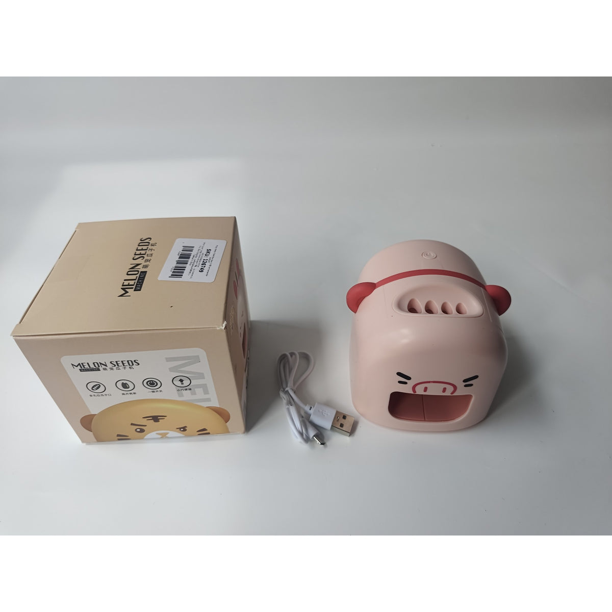Mașină de Decojit Semințe de Floarea Soarelui și Pepene, Deschizător Electric cu 4 Orificii, Protecție Dinți, Încărcare USB, Model Porcușor, Material ABS, 9.7x10x8.6 cm, Roz