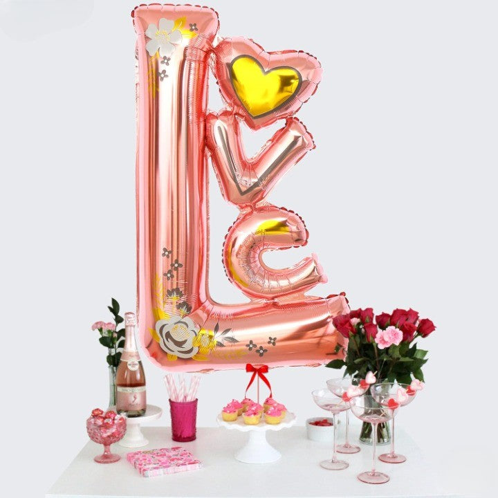 Balon din Folie Metalizata, Model LOVE, Figurine Tematica Iubire, Umflare Aer sau Heliu, Include Pai, 110x64 cm, Roz