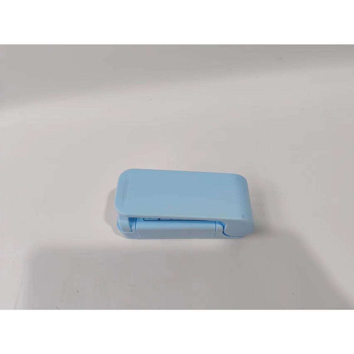 Mini Aparat de Sigilat Pungi, Dispozitiv Portabil de Etansare Termica cu Spate Magnetic, Alimentare 2 Baterii AA, Material ABS, 9.7x3 cm, Albastru