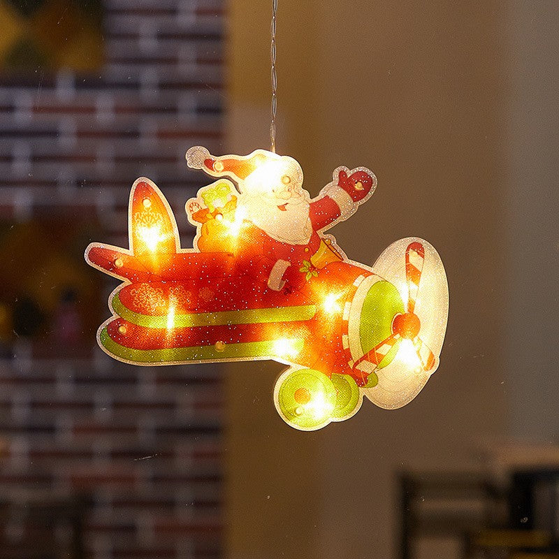 Decoratiune De Craciun Pentru Fereastra, Model Avion Cu 20 LED-uri, Efect Flash Si Fixare Cu Ventuza, Plastic, 23 cm, Alb Cald