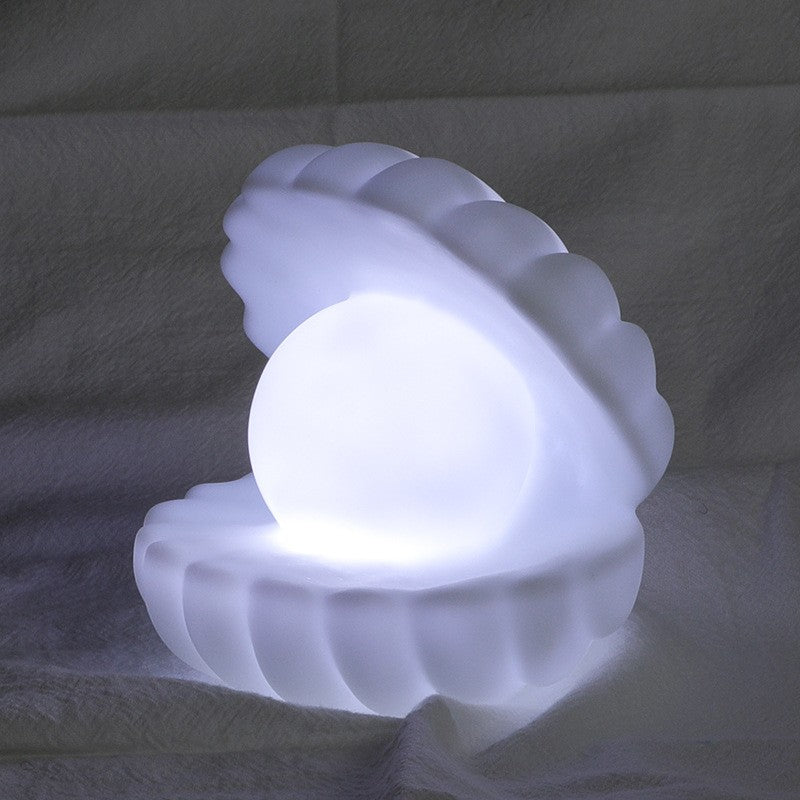 Lampa de Veghe Scoica cu Perla, Lumina Calda Ambientala, LED cu Baterii Incluse 3 x LR44, Plastic si Vinil, 6x5 cm, Alb
