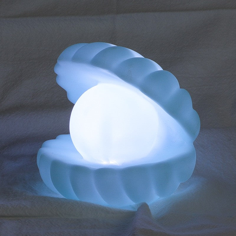 Lampa de Veghe LED, Model Scoica cu Perla, Lumina Calda Ambientala, Plastic si Vinil, 10 x 8.5 cm, 3 Baterii LR44 Incluse, Albastru