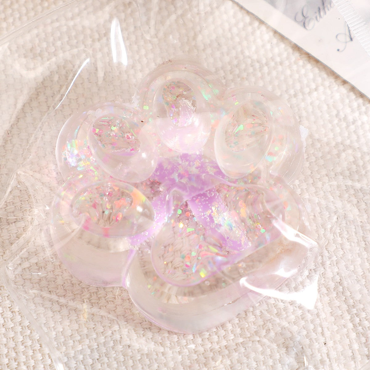 Jucarie Antistres Squishy, Labuta de Pisica cu Revenire Lenta, Squeeze Pinch Family, Material TPR Moale, 6.5 x 7 cm, Model 2 Flori, Transparent