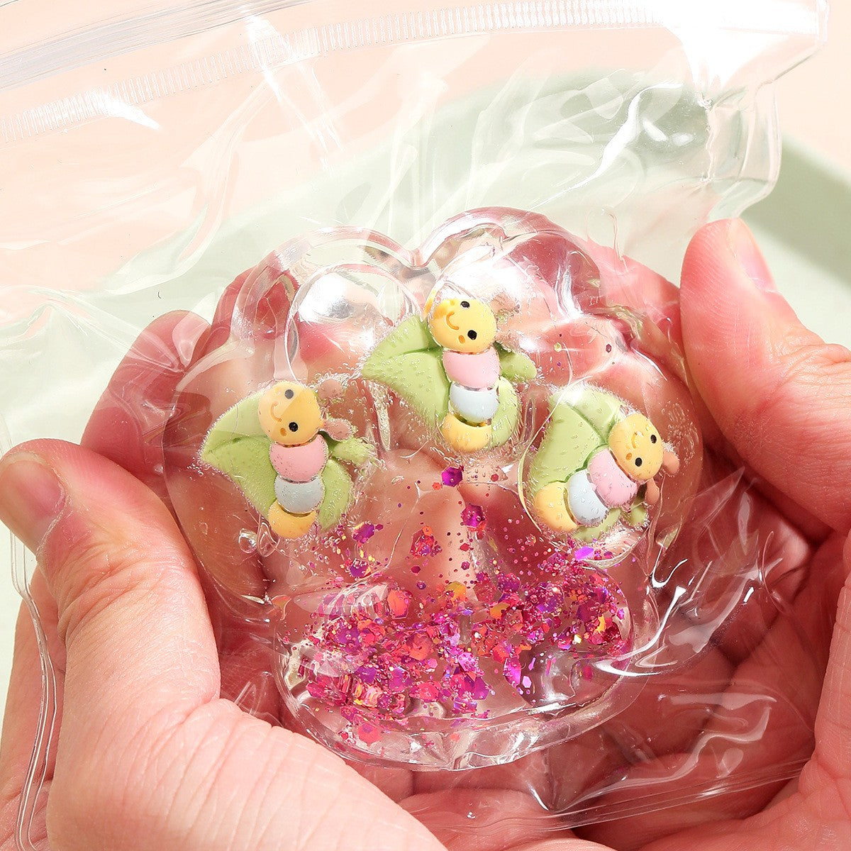 Jucarie Antistres Squishy, Labuta de Pisica cu Revenire Lenta, Model Transparent cu Inserții, Material TPR Moale, 6.5 x 7 cm, 62 g