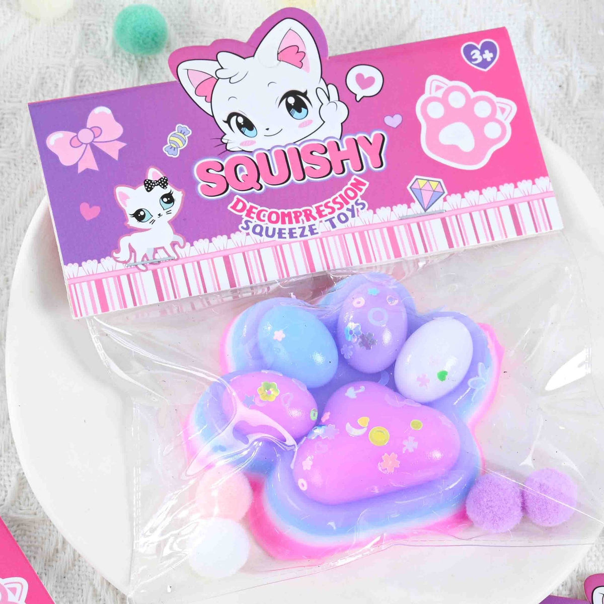 Jucarie Antistres Squishy, Labuta de Pisica Pufoasa cu Revenire Lenta, Material TPR Moale, Terapie Senzoriala, 7.5 x 6 cm, Multicolor