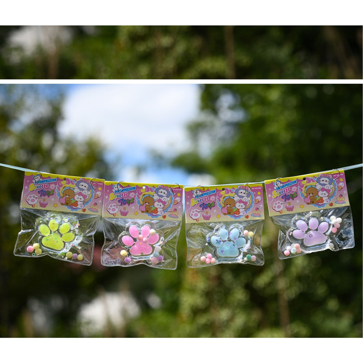 Jucarie Antistres Squishy, Labuta de Pisica Pufoasa, Revenire Lenta pentru Terapie Senzoriala, Material TPR, 7.5 cm, Multicolor