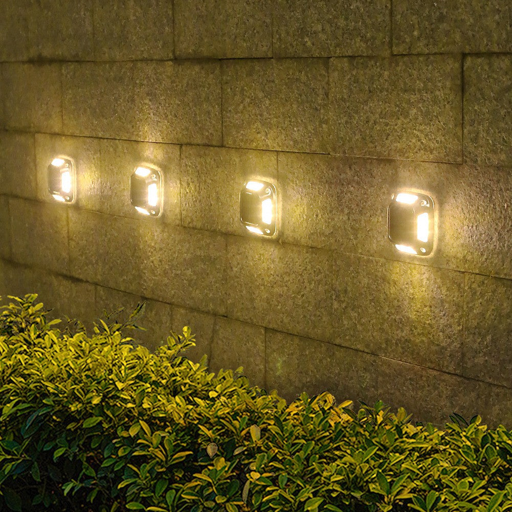 Set 4 Lămpi Solare LED pentru Grădină, 8 LED-uri, Rezistență IP65, Montare pe Perete sau Sol, ABS și Policarbonat, 9 x 9 x 5.5 cm, Lumină Alb Cald, Gri