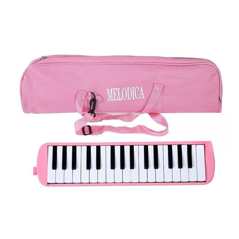 Muzicuta Melodica 32 Clape, Instrument Muzical Educativ pentru Incepatori si Copii, Clape cu Note Imprimate, Material ABS, Include Husa si Accesorii, 45 x 13 x 7 cm, Roz