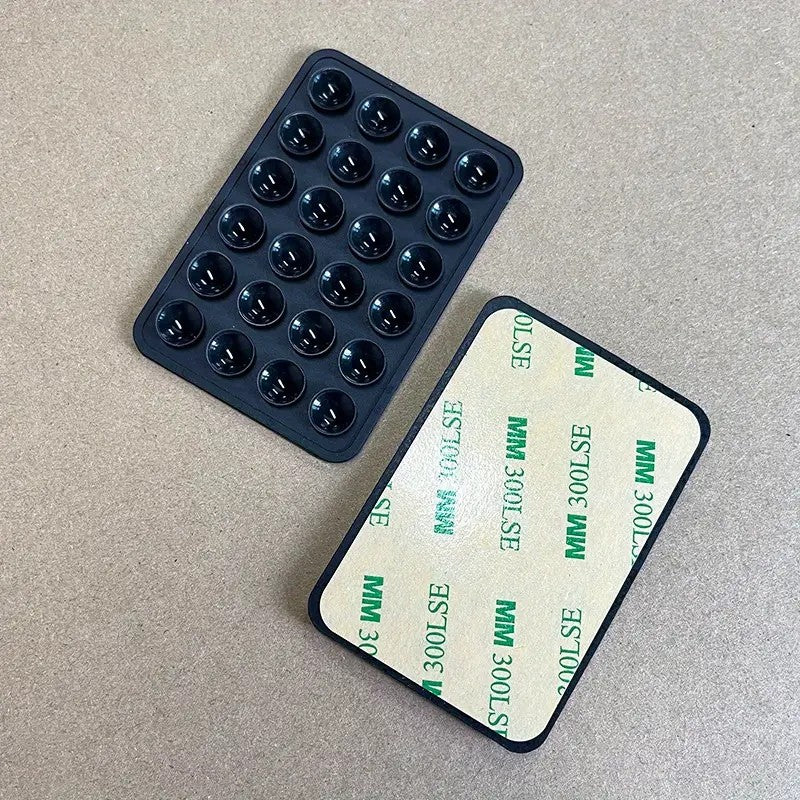 Suport Adeziv Universal pentru Telefon si Tableta, cu 24 Ventuze pentru Selfie si TikTok, Silicon Ecologic, 8 x 5.5 x 1 cm, Negru
