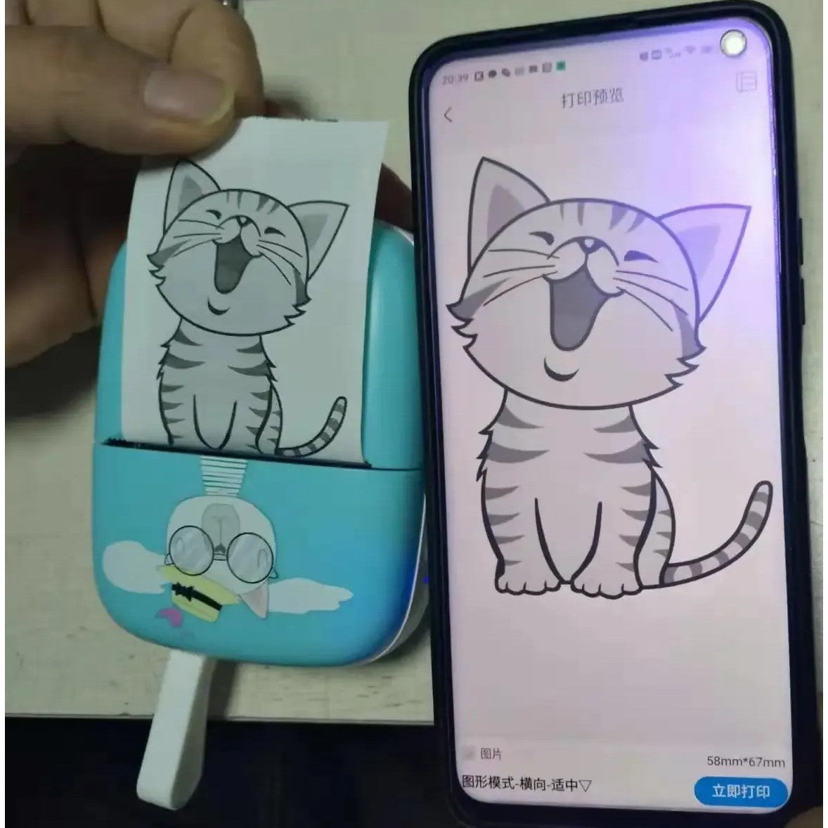 Mini Imprimanta Foto Portabila, Conectare Bluetooth, Tehnologie Termica Fara Cerneala, Design Pisica, Rezolutie 200 DPI, Incarcare USB, Baterie 1000 mAh, Include 10 Role Hartie si Markere, Albastru