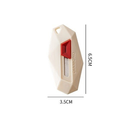 Cutter pentru Cutii si Colete, Varf Rotunjit cu Lama Zimtata, Rebound Automat si Magnet, ABS si Otel Inoxidabil, Tip Breloc, 6.5x3.5 cm, Crem