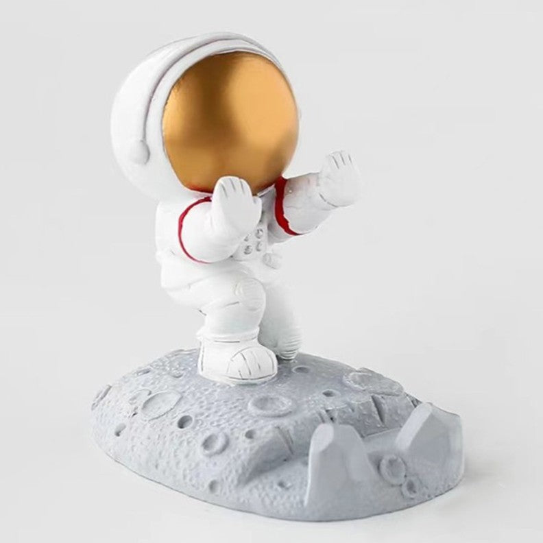Suport Telefon pentru Birou, Statueta Decorativa Model Astronaut, Suport Telefon pentru Copii, Rasina, 9 x 6.5 x 10 cm, Alb si Auriu