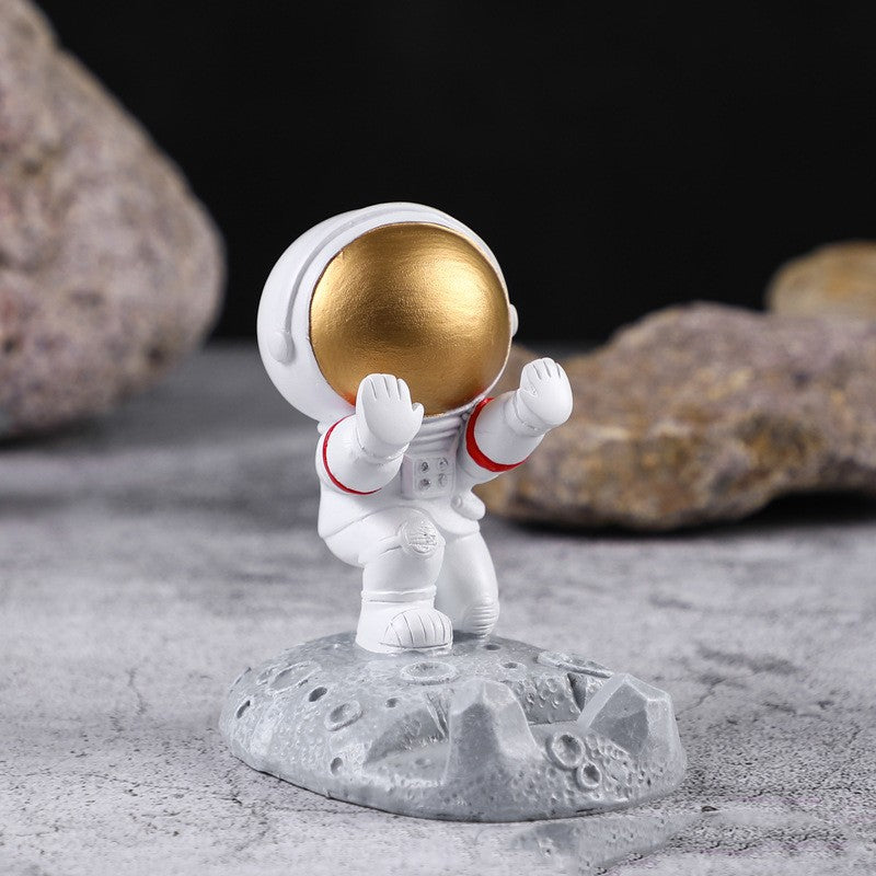 Suport Telefon pentru Birou, Statueta Decorativa Model Astronaut, Suport Telefon pentru Copii, Rasina, 9 x 6.5 x 10 cm, Alb si Auriu