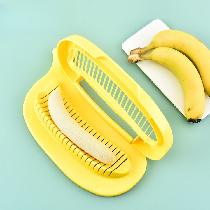 Feliator Multifunctional pentru Legume si Fructe, Design Model Banana, Lame Otel Inoxidabil, Accesorii Bucatarie, 28.8x18.3 cm, Galben