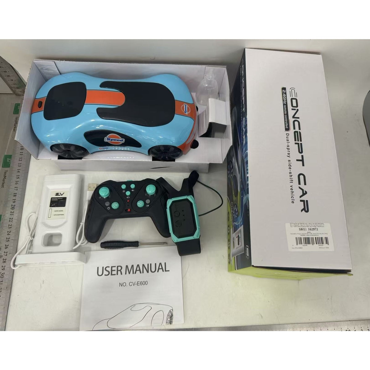 Masinuta Smart cu Telecomanda si Control prin Gesturi, Drift 360 si Efect Abur, Statie Incarcare EV, Plastic, 24x12.4x7.1 cm, Albastru/Portocaliu