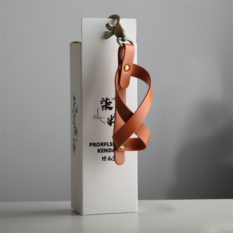 Husa Kendama pentru Depozitare si Transport, Model Breloc cu Catarama si Capse, Piele Ecologica, 12 x 6 cm, Maro Deschis