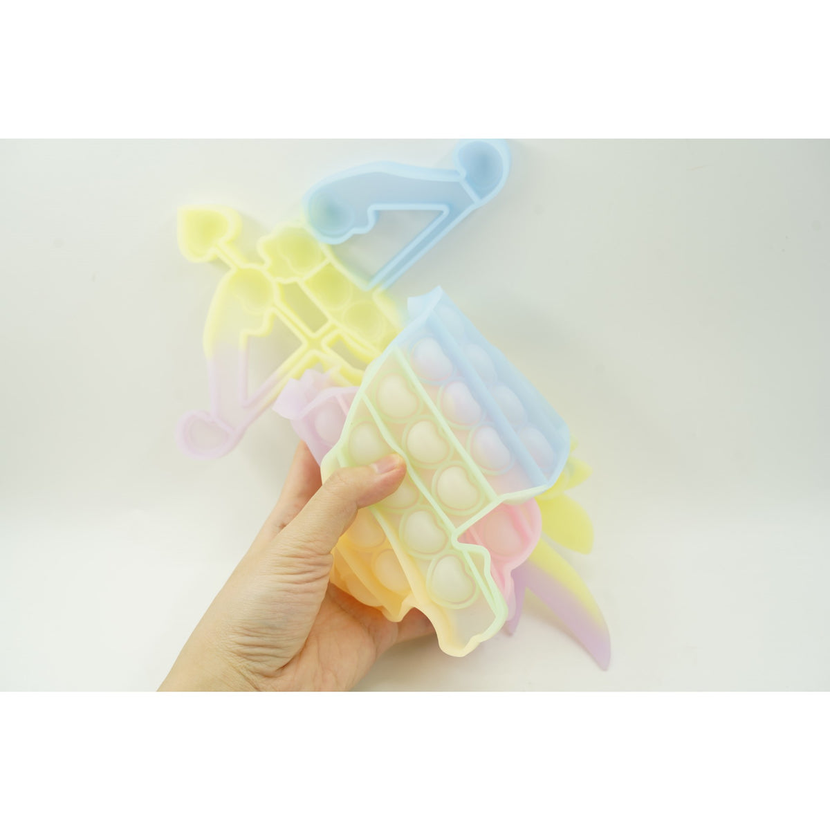 Jucarie Antistres Pop It Now And Flip It, Senzoriala Fosforescenta, Silicon, Cupidon, Multicolor, 40x45 cm