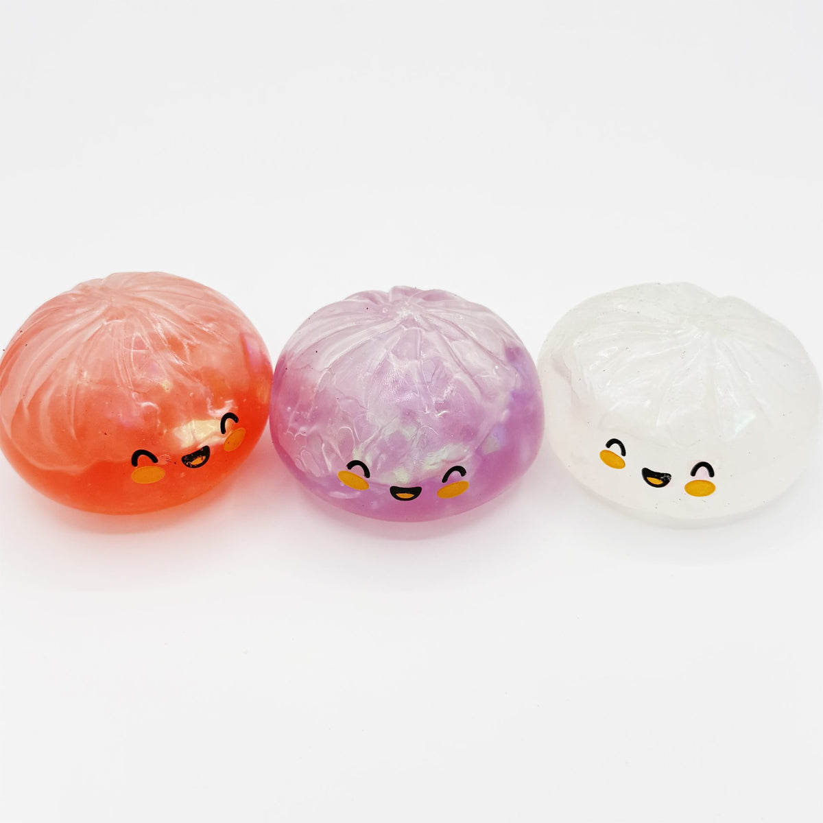 Jucarie Squishy Antistres Dumpling, Fata Zambitoare Sclipici, Termoplastic, 8.5 x 8.5 cm, Culoare Mix Surpriza