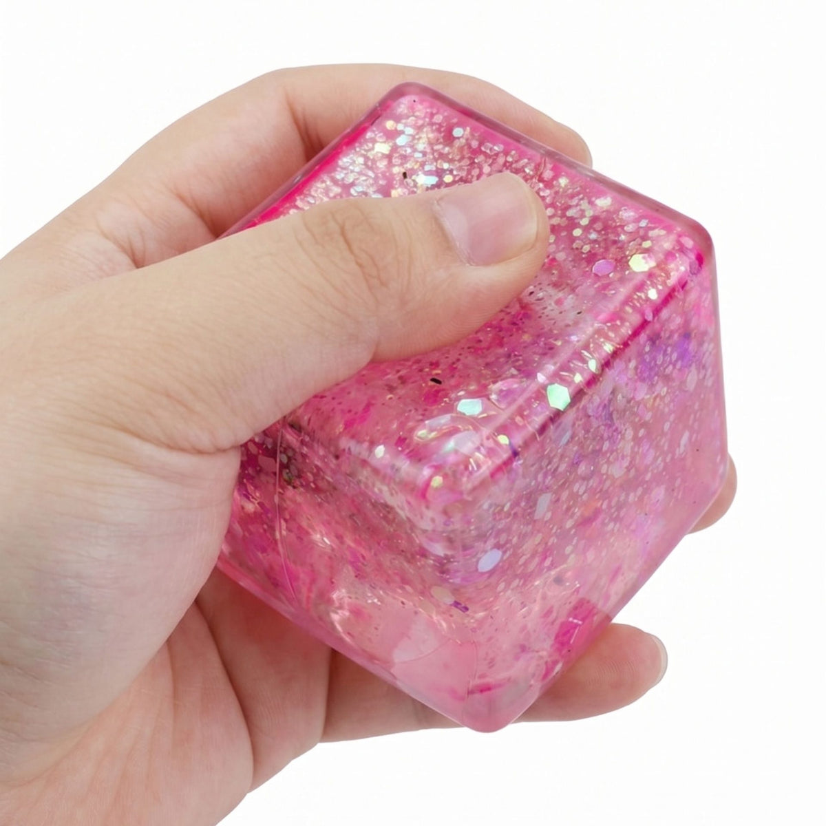 Jucarie Squishy Antistres, Cub Fidget Ice Cube cu Sclipici, Revenire Lenta, Material TPR, 4.5x4.5 cm, Roz