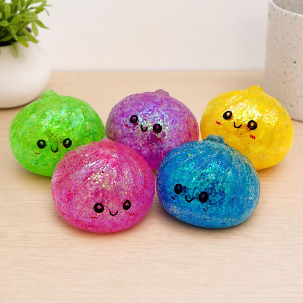 Squishy Dumpling Antistres, Fata Zambitoare cu Sclipici si Bile de Hidrogen, Revenire Lenta, Termoplastic, 5.5 x 5.5 x 5.5 cm, Culoare Mix