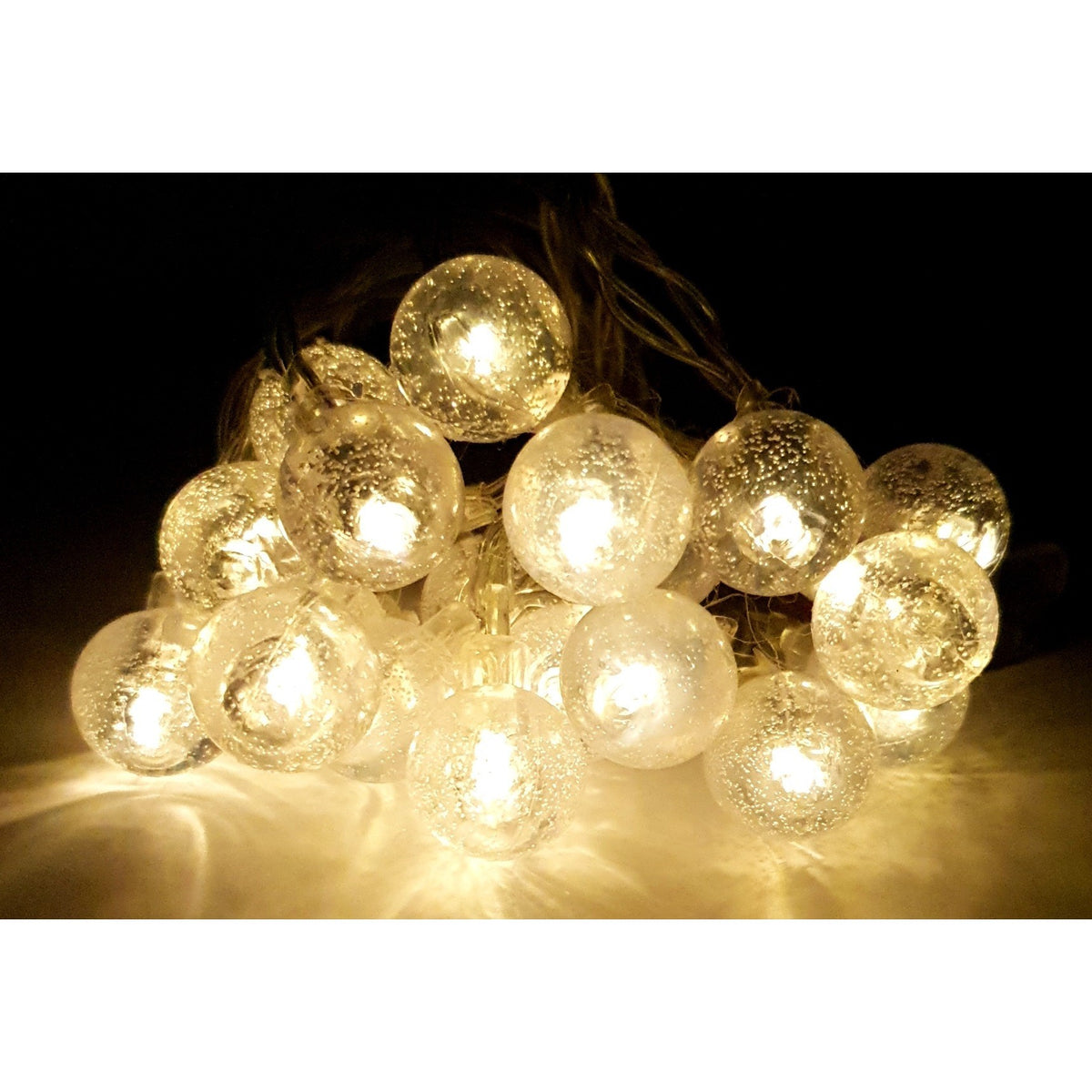 Instalatie de Craciun Tip Sir, 20 LED-uri Alb Cald, Alimentare pe Baterii, Globuri Transparente, Fir Transparent, Lungime 2.5 m