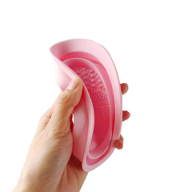 Dispozitiv Curatare Pensule si Buretei Machiaj, Recipient Pliabil cu Striatii pentru Igienizare si Suport Uscare, Silicon, 14.5 x 11.5 cm, Roz