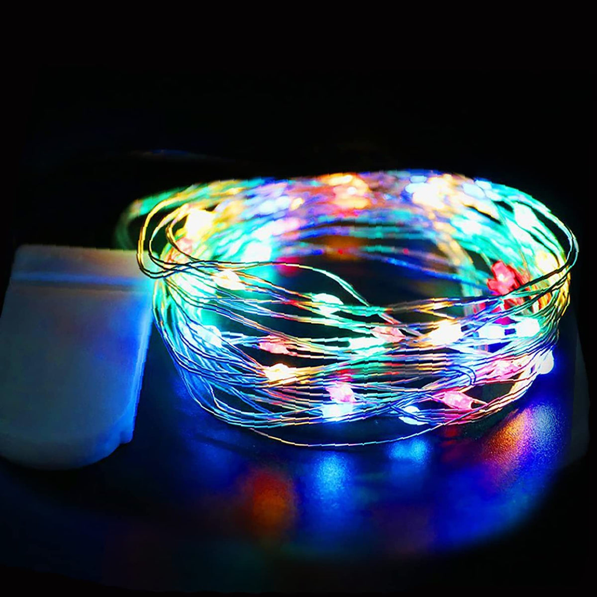 Instalatie Craciun Liniara, Sir 10 LED-uri, Rezistenta la Umezeala si Inghet, Fir Aliaj Zinc, Alimentare 2 Baterii CR2032 Incluse, Multicolor, 1 m