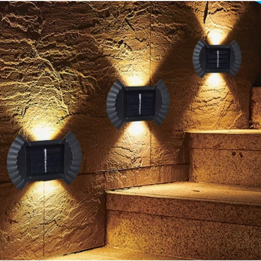 Set 4 Aplice Solare LED Bidirectionale pentru Perete, Lampi de Exterior Impermeabile IP65 cu 8 LED-uri, Autonomie 8-12 Ore, Design Funda, Material ABS, 10 x 7.5 cm, Lumina Alba Calda
