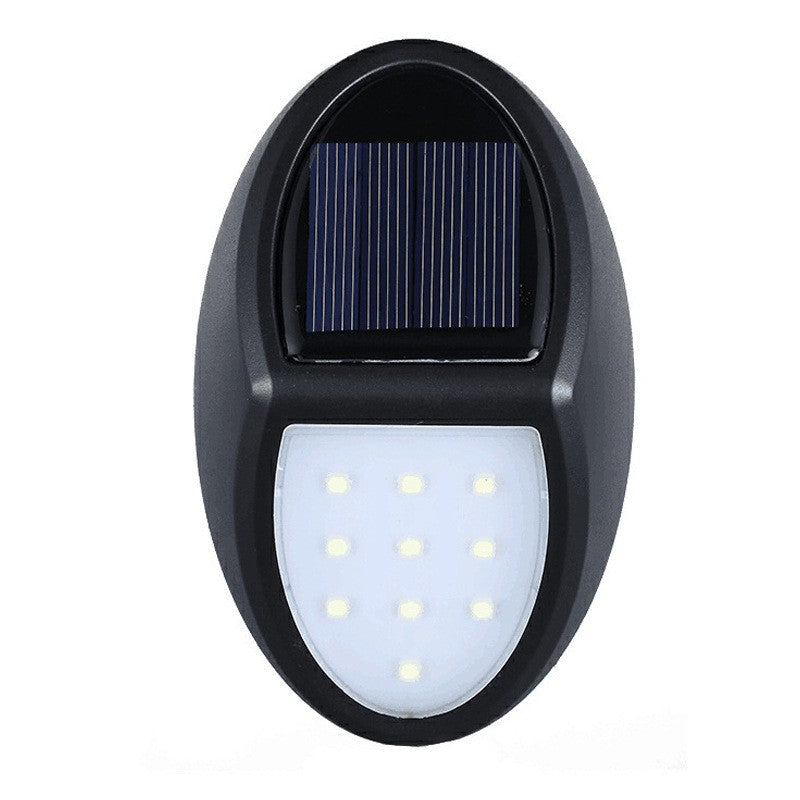 Aplica Solara LED de Perete, Lampa Exterior Ovala cu Senzor de Lumina, Protectie IP65, 10 LED-uri, Autonomie 8-10 Ore, Plastic, 12 x 7.5 cm, Alb Rece
