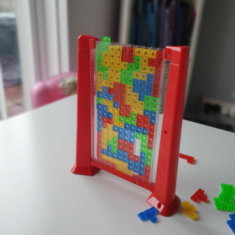 Joc De Inteligenta Tetris Puzzle 3D, Tangram Montessori Interactiv, Plastic, 70 Piese Multicolore, Cadru Rosu, 23 x 19.8 x 5 cm