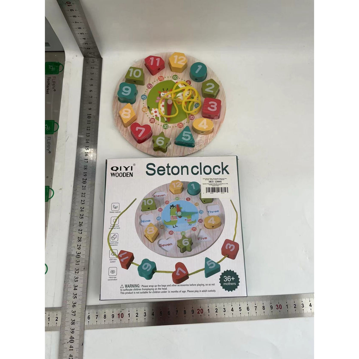 Jucarie Educativa Montessori, Ceas Girafa pentru Invatare Timp si Forme Geometrice, Lemn Masiv, 12 Piese, 17 cm, Multicolor, +36 Luni