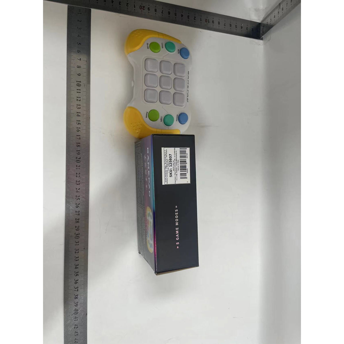 Jucarie Interactiva Tip Consola Pop It, 600 Niveluri si 5 Moduri de Joc, Lumini RGB si Sunete, ABS Fara BPA, Galben/Gri