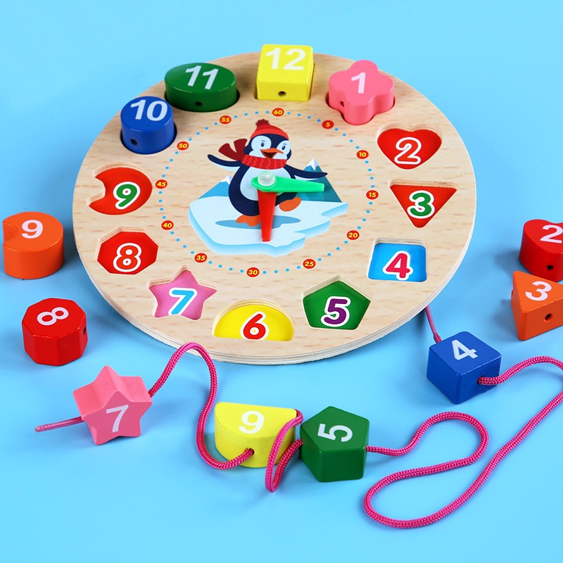 Jucarie Educativa Montessori, Ceas Din Lemn Cu Forme Geometrice Si Snur De Insirat, Model Pinguin, 12 Piese, Multicolor, + 36 Luni, 17.2 cm