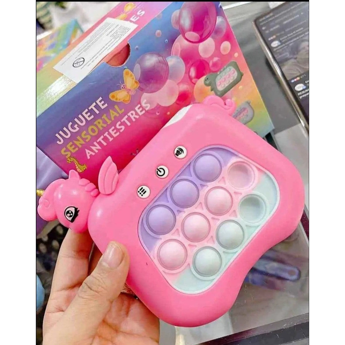 Jucarie Interactiva Tip Consola Pop-It pentru Copii, Joc de Memorie si Coordonare cu 120 Nivele, Efecte Sonore si Luminoase, Material ABS si Silicon, 13.5 x 12.5 cm, Model Unicorn, Fucsia