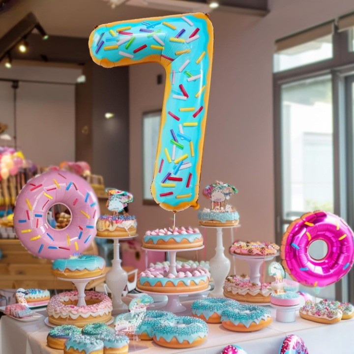 Balon Aniversar Cifra 7, Figurina din Folie Metalizata, Imprimeu Gogosi Candy Bar, Umflare Aer sau Heliu, Inaltime 100 cm, Multicolor