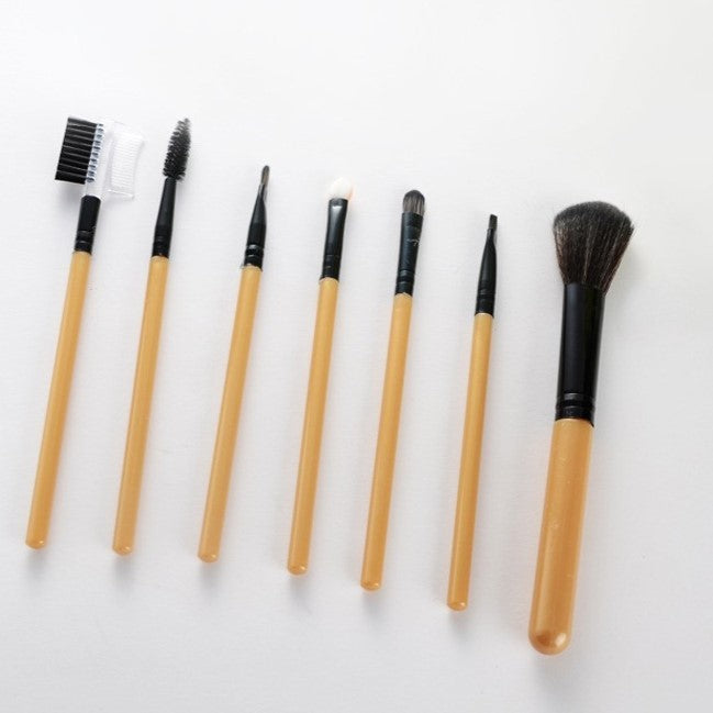 Set Portabil 7 Pensule de Machiaj, Fibre Sintetice si Silicon Moale, Maner Plastic, Include Husa de Depozitare, Auriu