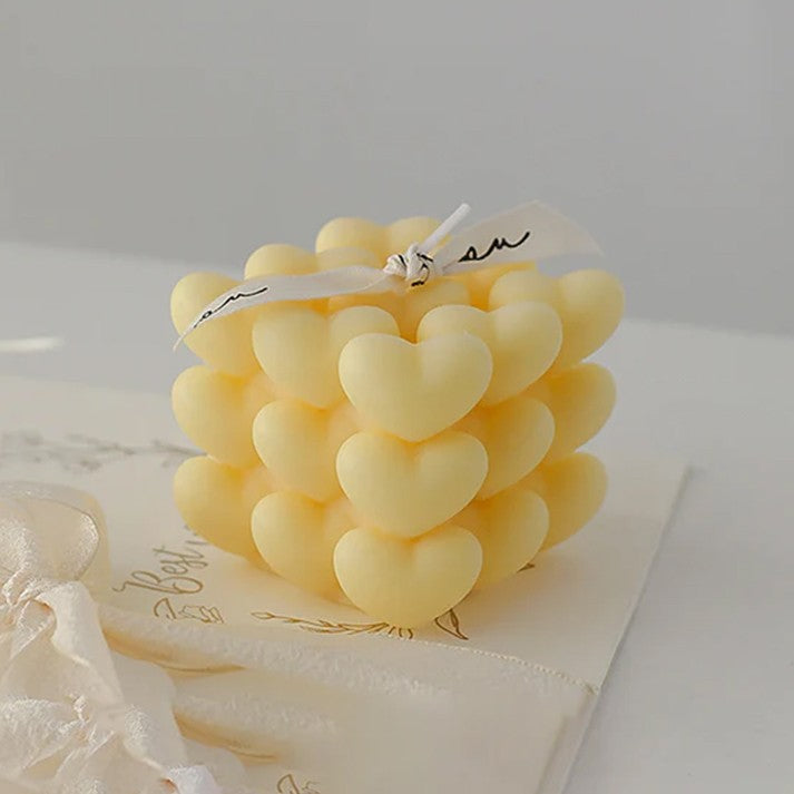 Lumanare Parfumata Decorativa, Model Cub din Inimioare Abstract, Aromaterapie cu Musetel, Ceara de Soia si Parafina, Lucrata Manual, 6 x 5.5 cm, Galben