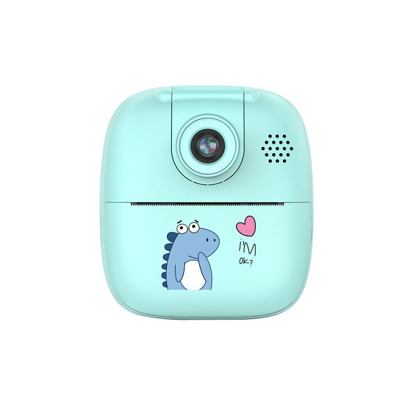Camera Foto Instantanee Pentru Copii, Functie Printare Termica Alb-Negru, Selfie 180 Grade, Ecran HD 2 Inch, Bluetooth, 24MP, Video 720P, Set 10 Role Hartie si Markere, Model Dino, Turcoaz