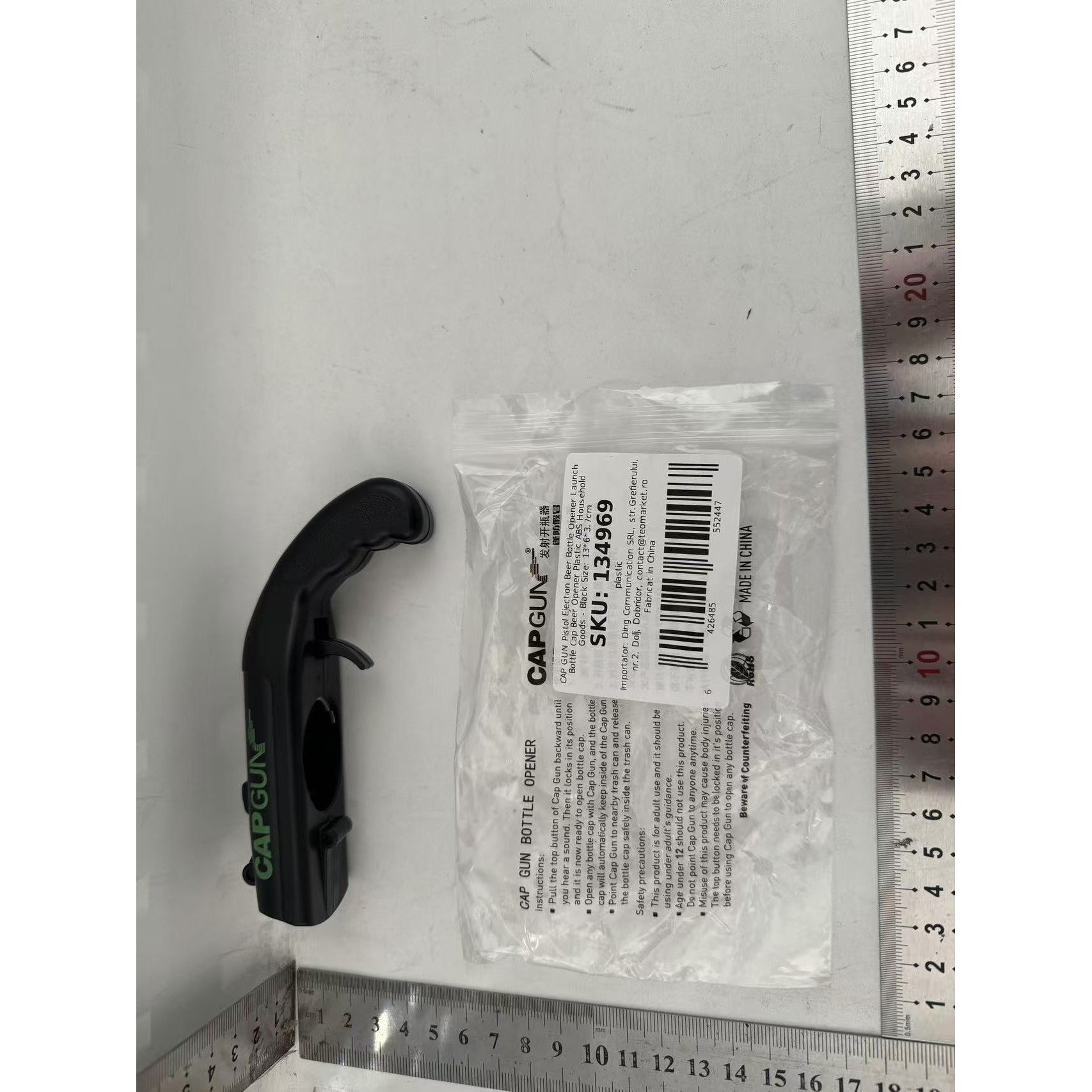 Deschizator de Sticle Tip Pistol, Dispozitiv pentru Lansat Capace Metalice, Plastic ABS Rezistent, 13 x 6 x 3.7 cm, Negru