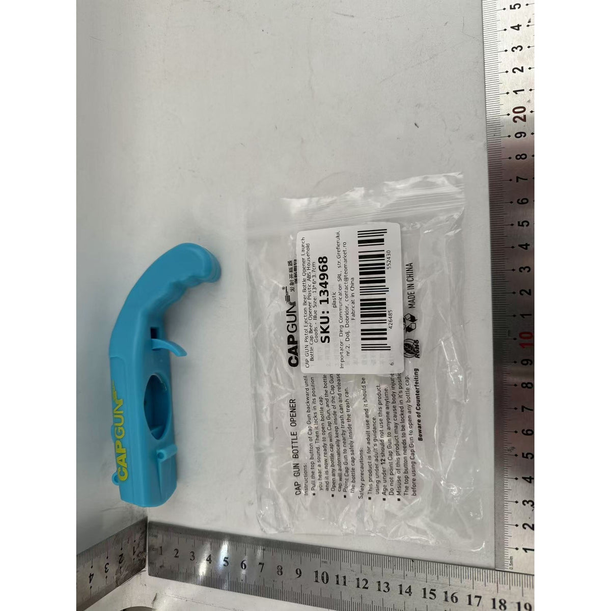 Deschizator de Sticle Model Pistol, Dispozitiv pentru Capace Metalice cu Functie de Lansare, Plastic ABS Rezistent, 13 x 6 x 3.7 cm, Albastru