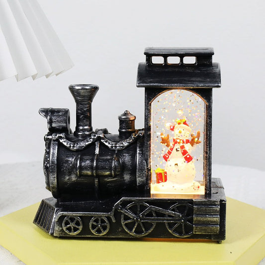 Decoratiune de Craciun Tip Locomotiva, Glob de Cristal cu Ninsoare Sclipitoare si Om de Zapada, Iluminare LED, Stil Vintage Bronze, Plastic si Sticla, 11.5 x 12.5 x 6 cm, Maro Transparent