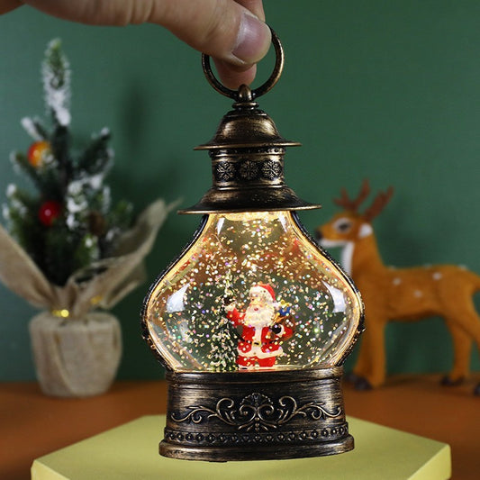 Felinar Decorativ De Craciun Cu Glob De Zapada Si Sclipici, Figurina Mos Craciun Cu Lumini LED, Stil Vintage Din Plastic, 14.5 x 9 x 3 cm, Rama Neagra, Transparent