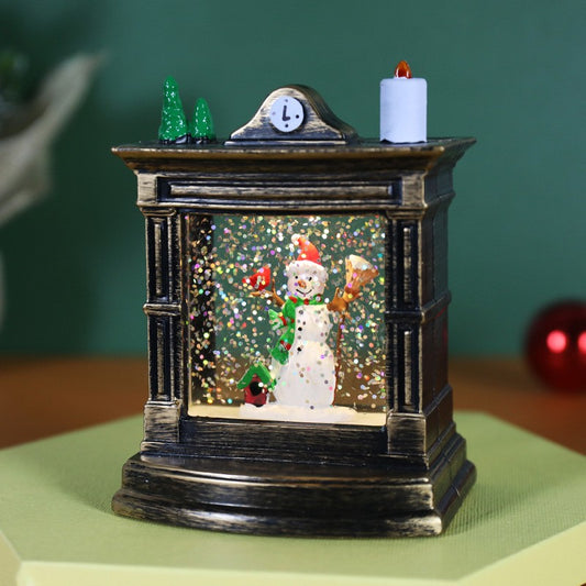 Decoratiune de Craciun Tip Semineu si Ceas Vintage, Glob de Cristal cu Ninsoare si Om de Zapada, Iluminare LED, Carcasa Bronz Antichizat, 11.5 x 8.5 x 6.5 cm