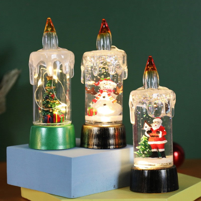 Decoratiune de Craciun Tip Lumanare cu LED, Glob de Zapada si Model Brad, Efect Ninsoare cu Sclipici, Plastic si Cristal, 13 x 5 x 5 cm, Baza Verde, Transparent